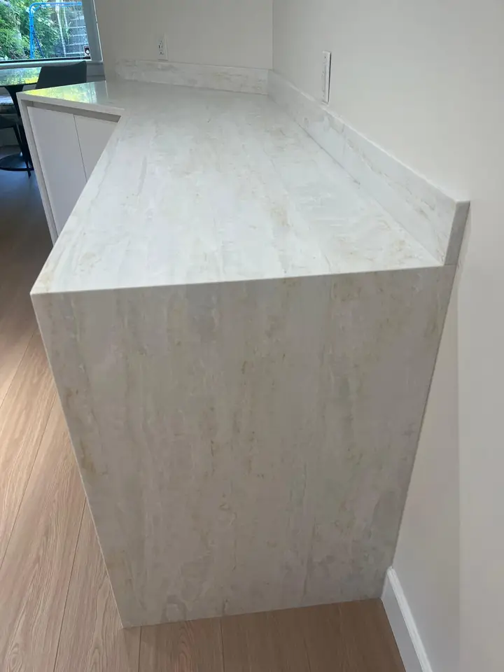 Countertop with a waterfall end panel in the renovated North Vancouver kitchen